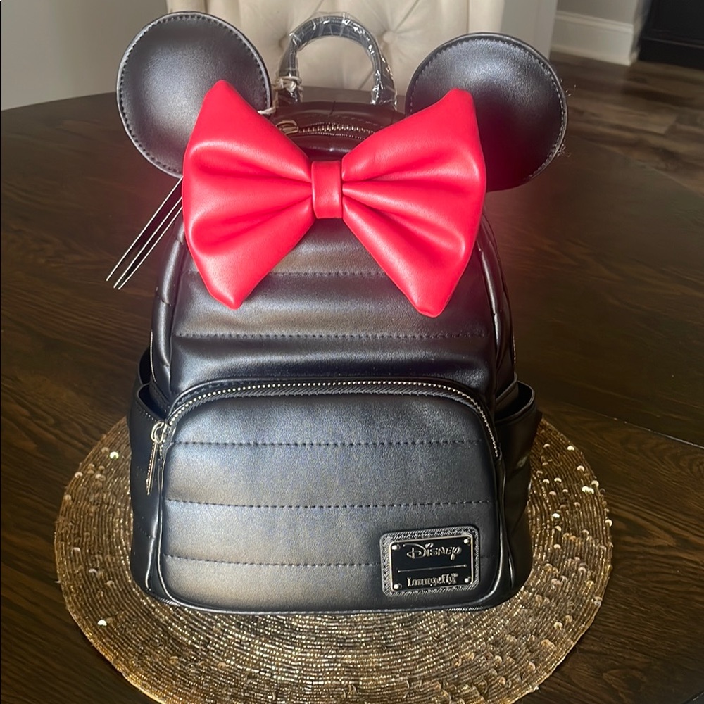 Disney red bow faux leather backpack